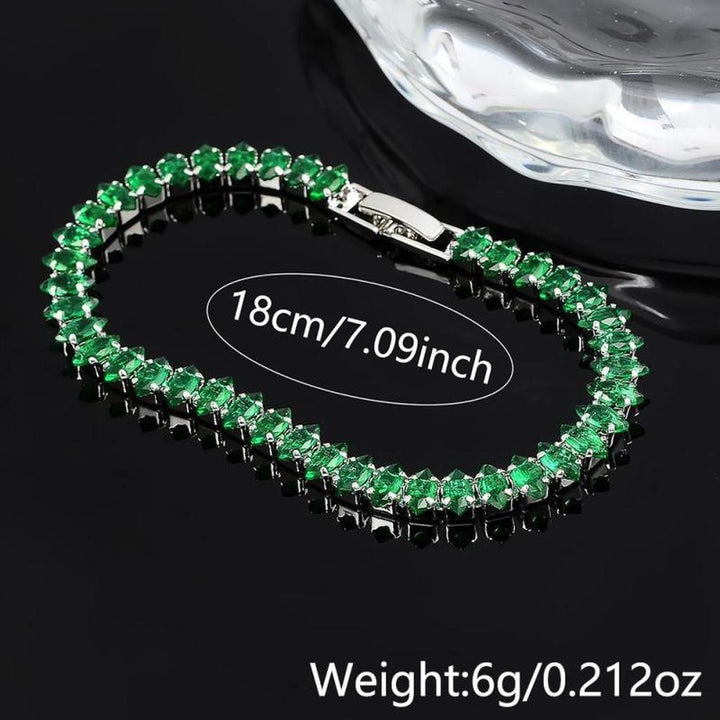 Náramek se smaragdovými kameny