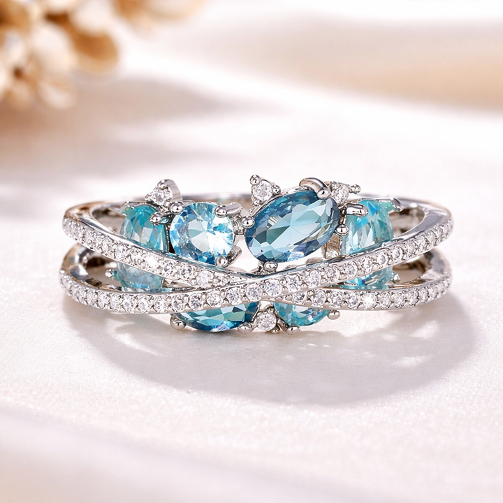 Stříbrný prsten kříž modrý lesk