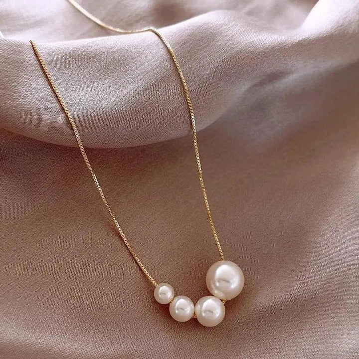 Gouden ketting met zoete parels