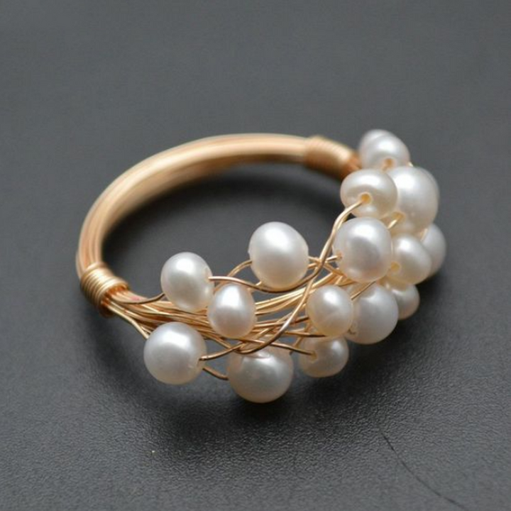 Retro ring met parelnestjes