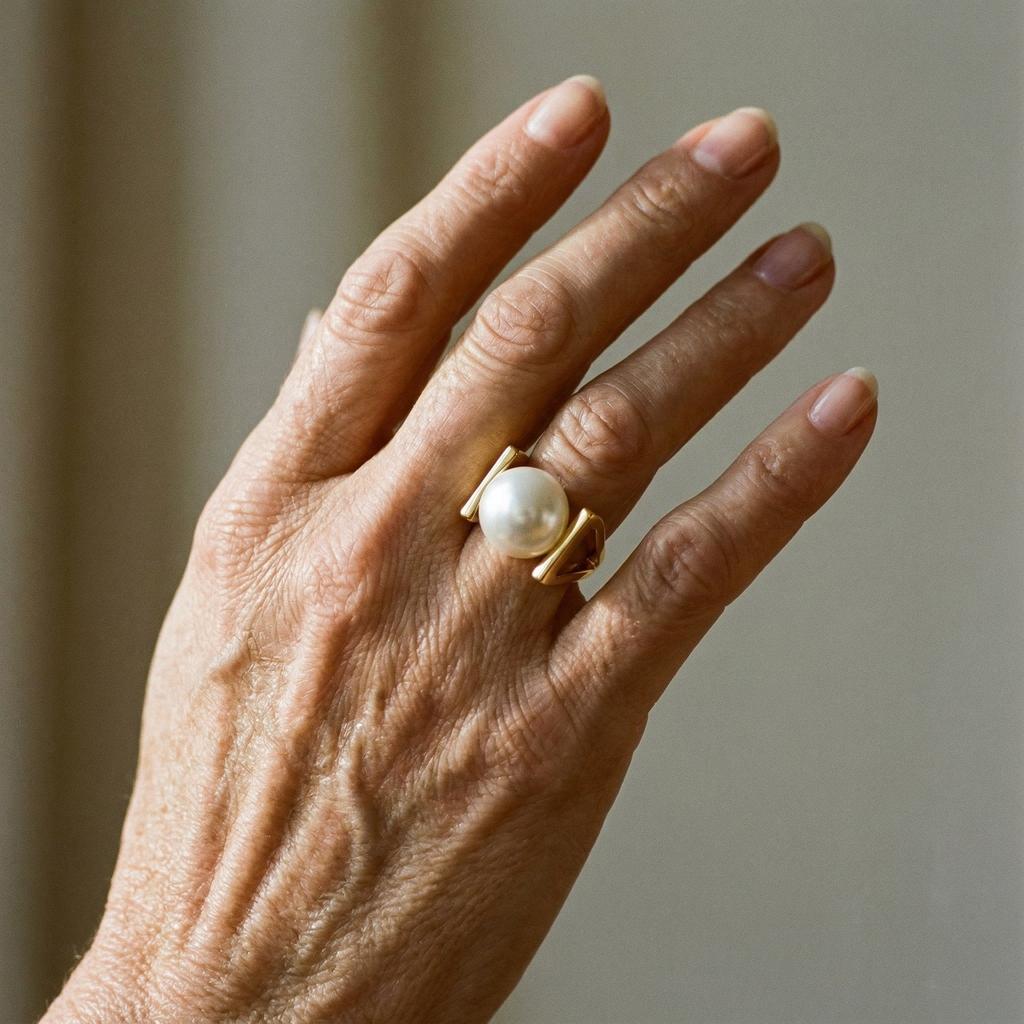 Retro gouden ring met parel-inzetstukken