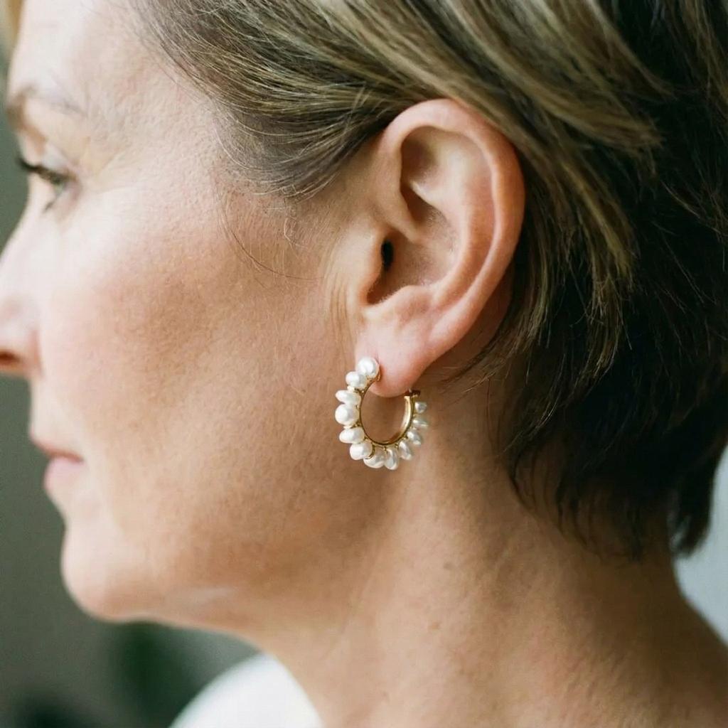 Retro oorbellen met witte parel